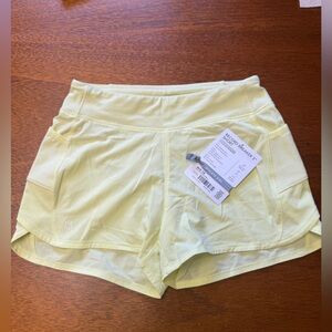 Athleta Soft Yellow Athletic Shorts